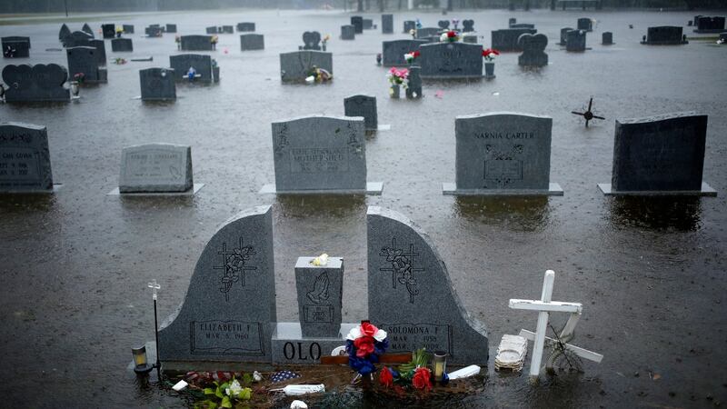 A cemetery covered in floodwaters in Lumberton, North Carolina. Photograph: Luke Sharrett/The New York Times.