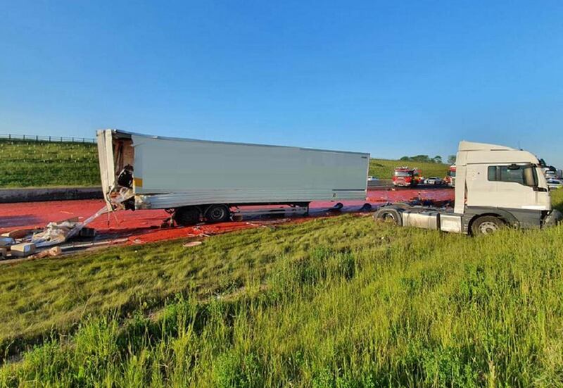 Jackknifed: the lorry was carrying tonnes of tomatoes and olive oil. Photograph: Highways England/PA Wire