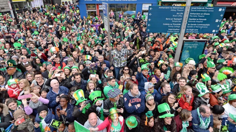 People watching from every vantage point in O’Connell Street, at the St Patrick’s Day parade, in Dublin yesterday. Photograph: Eric Luke/The Irish Times
