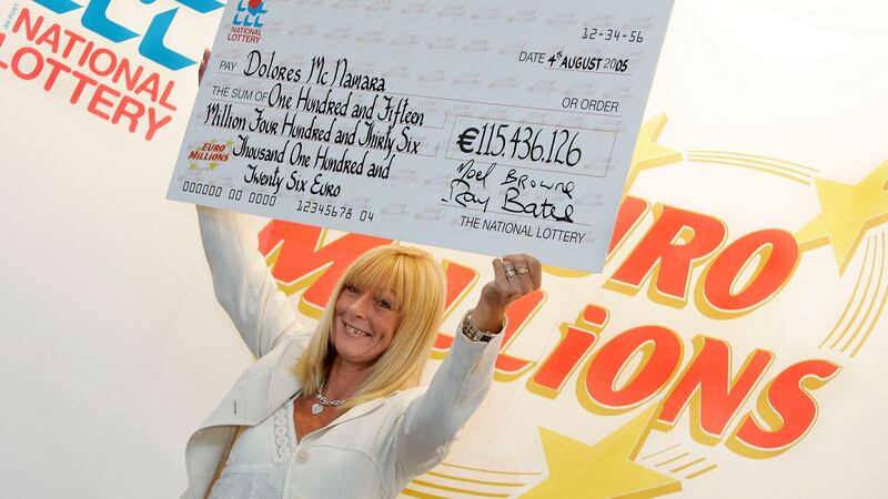 Dolores McNamara with her cheque for over €115 million. Photograph: Mac Innes Photography