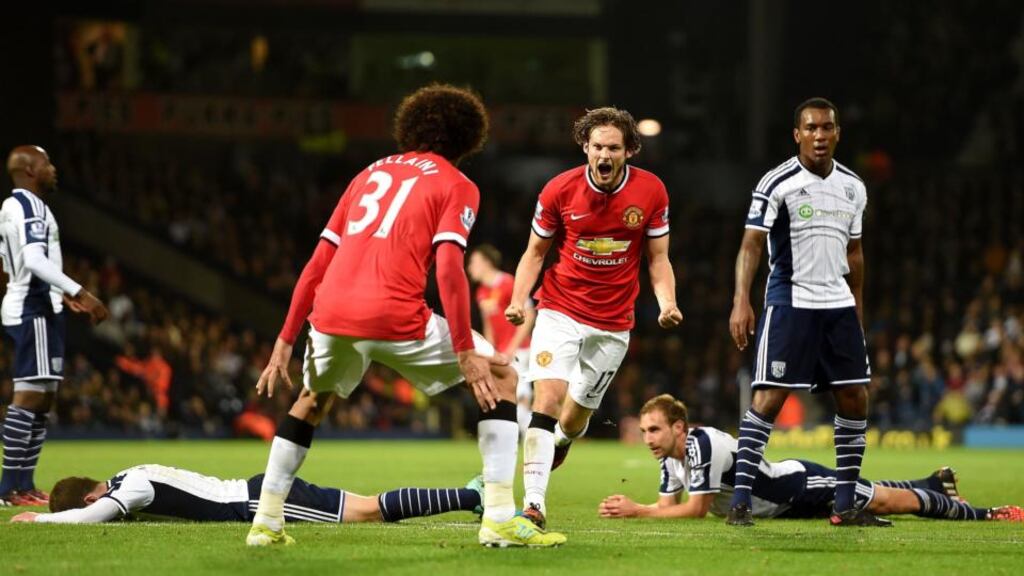 Manchester United’s Daley Blind celebrates scoring his team’s second goal against West Bromwich Albion during the Premier League match at The Hawthorns. Photograph: Martin Rickett/PA