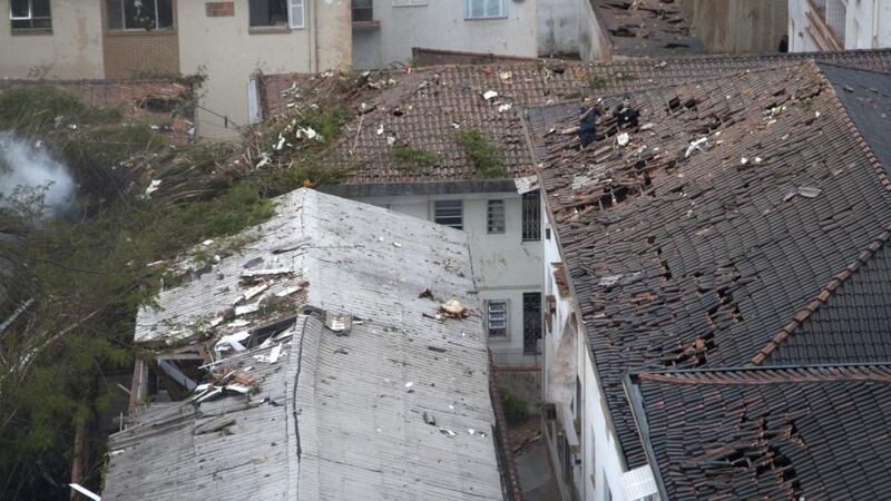 View of damaged buildings where an aircraft carrying Eduardo Campos crashed in the residential area Na Rua Vahia de Abreu in Santos, Sao Paulo state, Brazil, today. Photograph: EPA