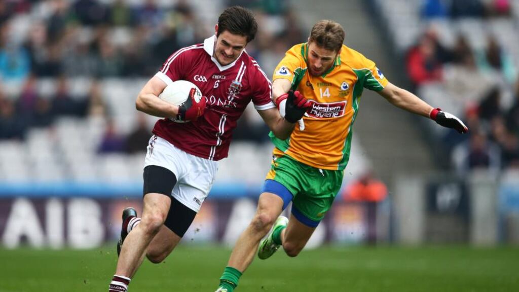 Slaughtneil’s Christopher McKaigue tries to outrun the challenge of Corofin’s Micheál Lundy during the AIB All-Ireland Club Senior Football Final at Croke Park. Photograph: Cathal Noonan/Inpho