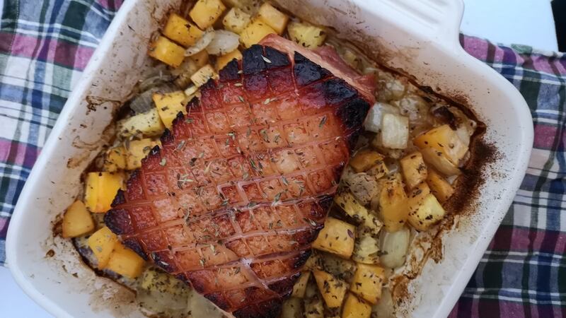 Roast bacon with pineapple, onion and turnip.