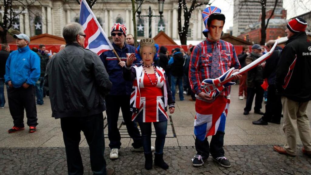 Loyalists in fancy dress take part in a march from the City Hall to mark the first anniversary of the council’s decision to restrict the flying of the Union flag in Belfast. Photograph: Cathal McNaughton/Reuters