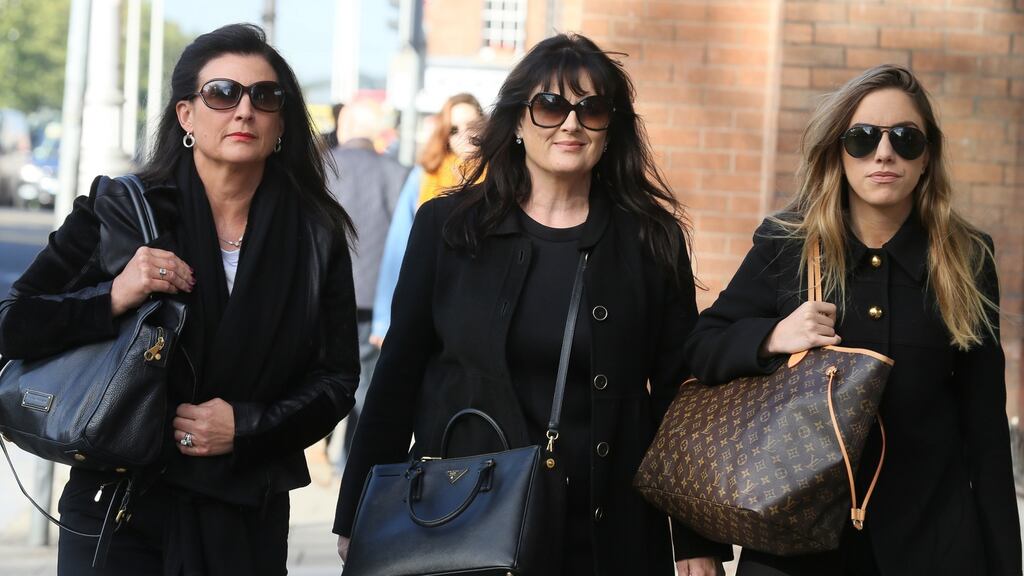 Michelle Morrison (centre) outside the Four Courts with her sister, Laura (left) and her daughter, Claudia for the continuation of a High Court hearing last month. Photograph: Collins Courts