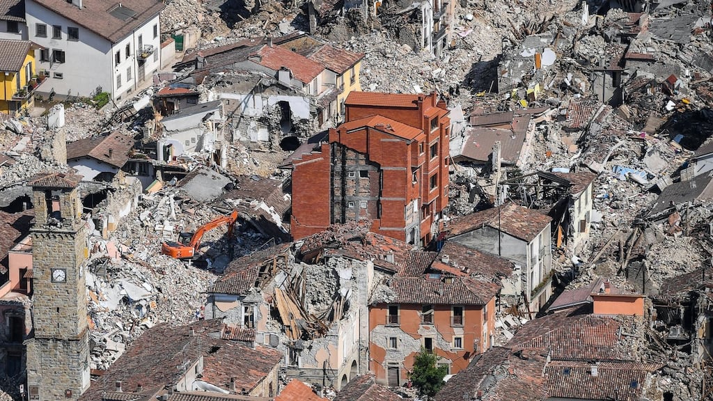 An aerial view of Amatrice, central Italy, badly damaged by an earthquake. Photograph: Alessandro Di Meo/ANSA