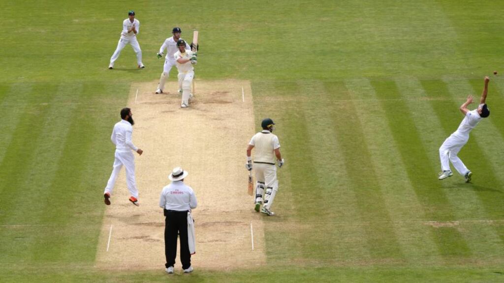 England captain Alastair Cook knocks the ball in the air before taking a catch to dismiss Australia’s Brad Haddin during the first Test at the Swalec Stadium in Cardiff. Photograph: Philip Brown/Reuters/Livepic