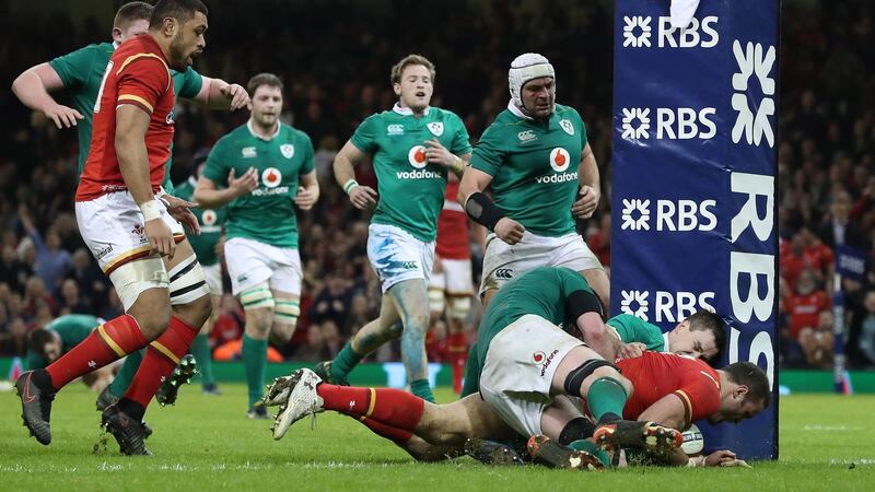 Wales Jamie Roberts scores a try during their Six Nations win over Ireland. Photo: Billy Stickland/Inpho