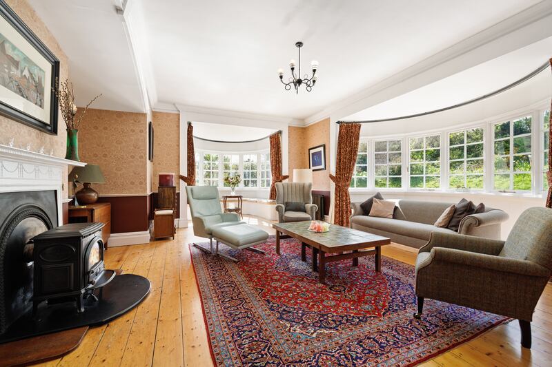 The drawing room has two bay windows