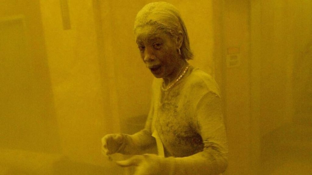 This 11th September 2001 file photo shows Marcy Borders covered in dust as she takes refuge in an office building after one of the World Trade Center towers collapsed in New York. Photograph: Stan Honda/AFP/Getty Images.