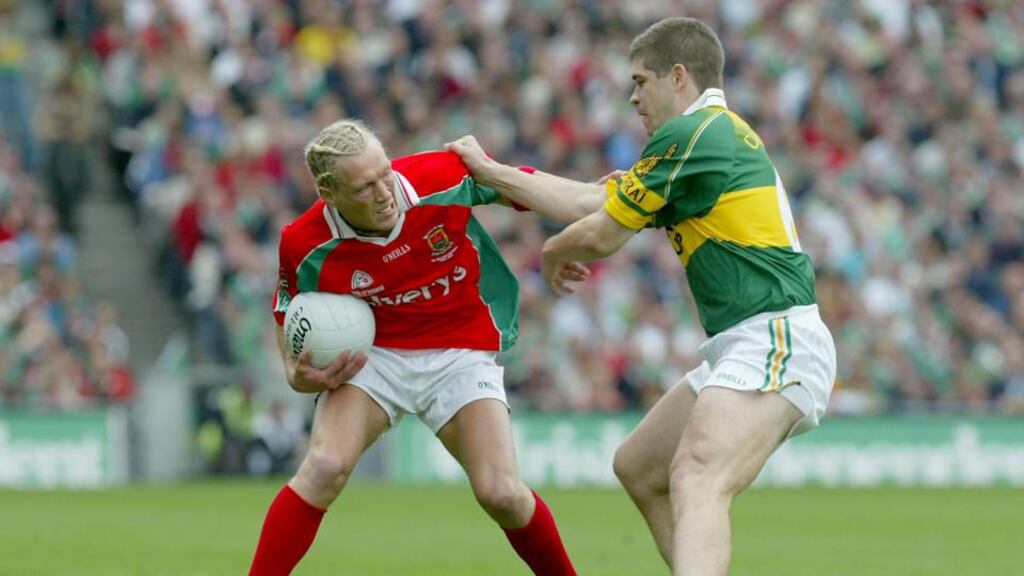 Mayo’s Ciarán McDonald tangle with Eamonn Fitzmaurice of Kerry in the 2004 All-Ireland football final, one of Mayo’s painful defeats over the years. Photograph: Morgan Treacy/Inpho