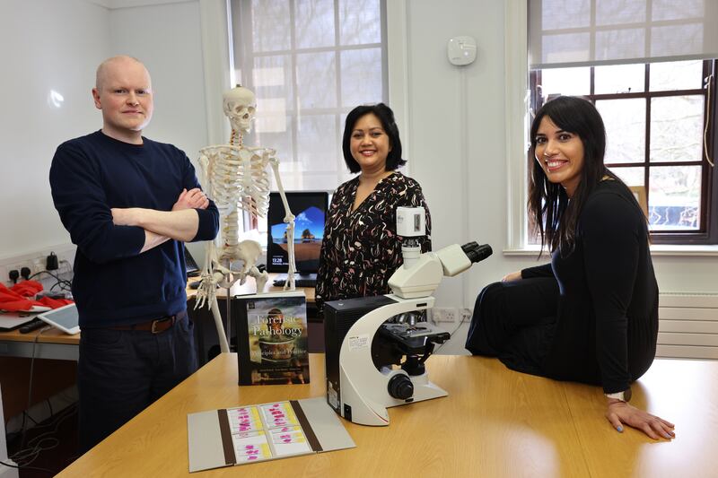 Andrew Hughes, author of The Coroner’s Daughter, and pathologists Jill Roman and Heidi Okkers at their Dublin office. Photograph: Dara Mac Dónaill