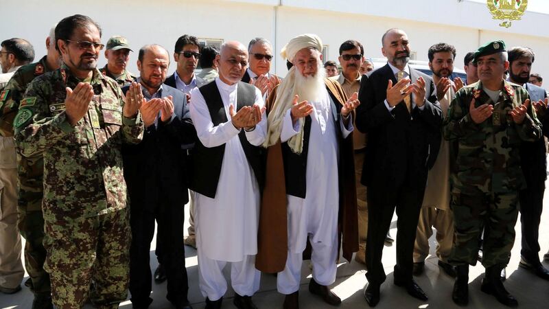 Afghanistan’s President Ashraf Ghani (third left) prays for scores of victims of the April 21st attack on an army base in Mazar-i-Sharif, northern Afghanistan. Photograph: Presidential Palace/Handout/Reuters