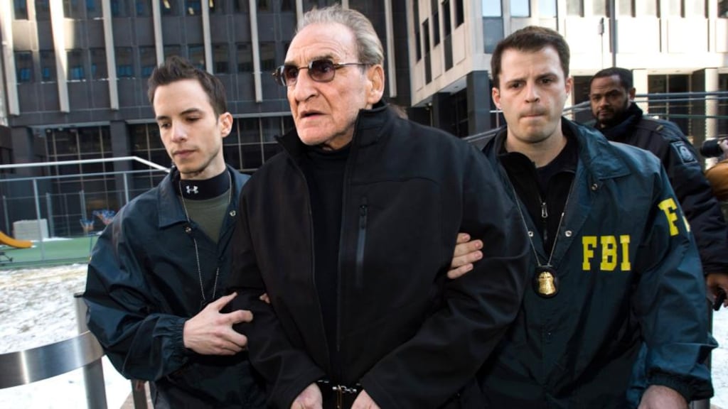 Vincent “Vinny” Asaro, the reported head of the Bonanno crime family, is escorted by FBI agents out of a New York federal building yesterday.