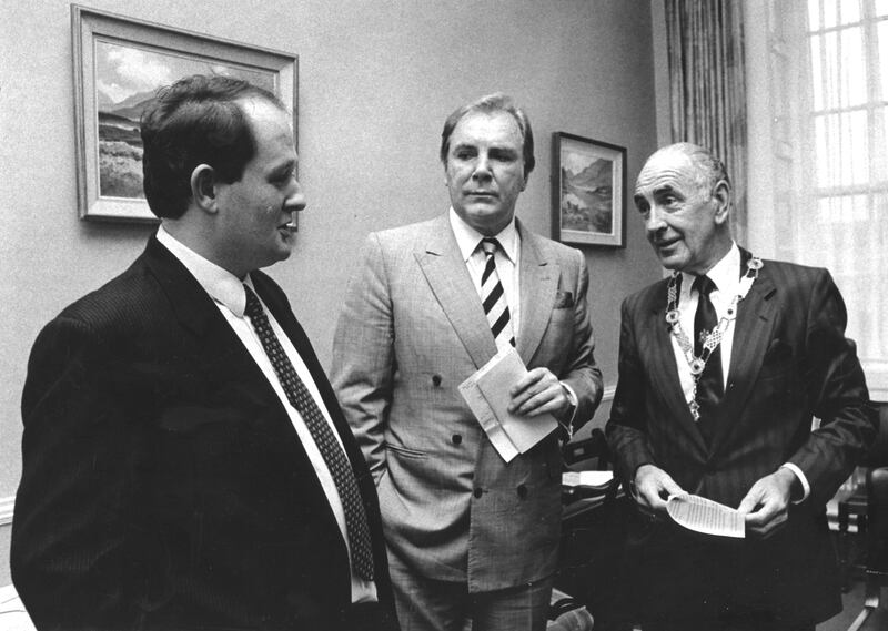 Tony O'Reilly, chairman of the Heinz Company, at the Incorporated Law Society in 1990 with Muiris O'Ceidigh (left) from Galway and Ernest Margetson, president of the Incorporated Law Society. Photograph: Joe St Leger