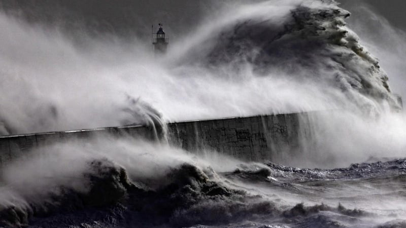 Storm waves battered the Newhaven breakwater and lighthouse as Storm Eunice made landfall. It was the worst storm to hit the UK for three decades. Photograph: Dan Kitwood/Getty