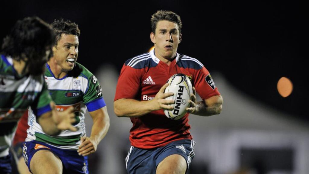 Munster’s Ian Keatley makes a break against Treviso. Photograph: Elena Barbini / Inpho