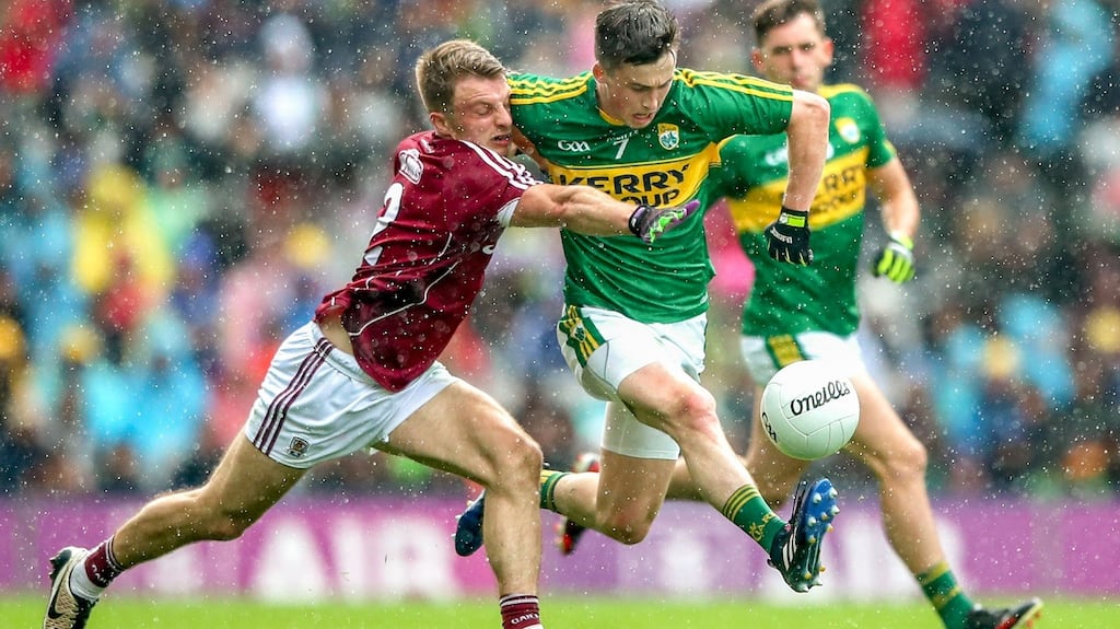 Galway’s Eoghan Kerin and Paul Murphy of Kerry. Photograph: James Crombie