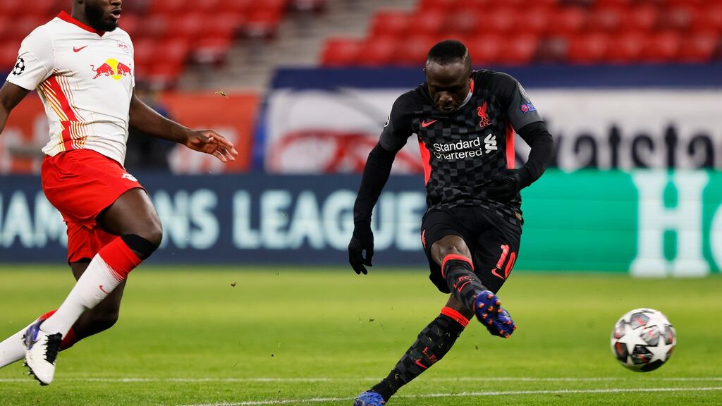 Sadio Mané scores Liverpool’s second goal during the Champions League round of 16 first leg game against RB Leipzig at Puskas Arena in Budapest. Photograph: Laszlo Szirtesi/Getty Images
