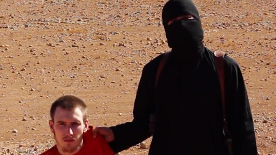 Screen grabbed image taken from footage released on the internet last week allegedly showing a militant threatening to behead Peter Kassig. Photograph: PA Wire