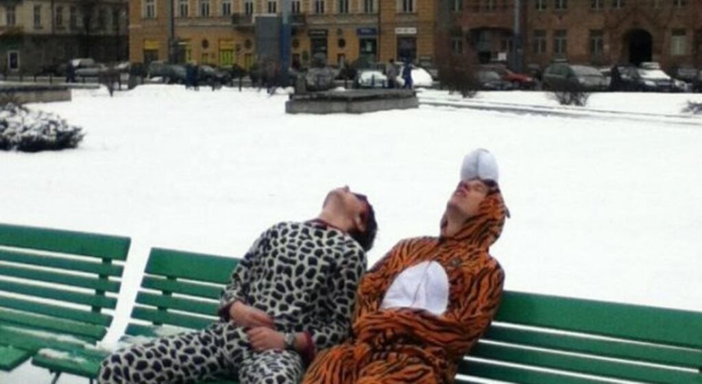 Will Nicklethwait and James Haynes take a breather in Warsaw, Poland, during the Trinity ‘Jailbreak’ challenge which saw 34 teams travel as far away from Trinity as possible within 36 hours without using any of their own money.