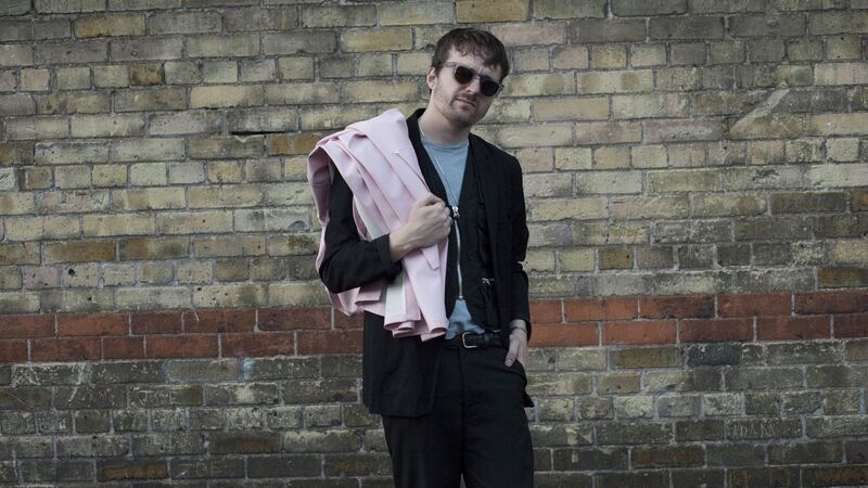 Brian Teeling, photographer: For a professional look,Teeling wears a pair of light wool black trousers, a cotton shirt and a slightly oversize jacket by Our Legacy.