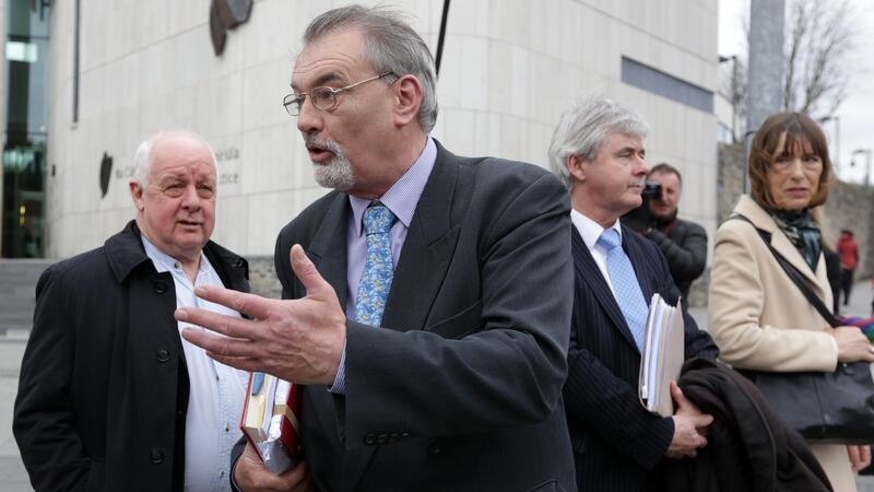 Ian Bailey (centre) at the Criminal Courts of Justice in Dublin. Also pictured are (L to R) filmmaker Jim Sheridan, Bailey’s solicitor Frank Buttimer and Bailey’s partner Jules Thomas. Photograph: Collins Courts.