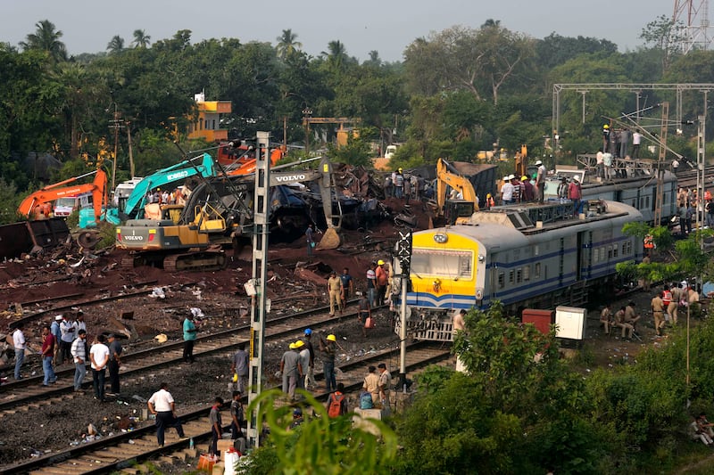 The scene of the crash in eastern India. Photograph: Rafiq Maqbool/AP