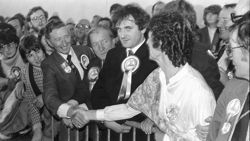 Tom Leonard, the successful Fianna Fail candidate in the Dublin Central by-election in November 1983, is congratulated by the Fine Gael candidate, Mary Banotti. Between them stand Charlie Haughey and a young-looking Bertie Ahern, then Fianna Fail's director of elections. Photograph: Paddy Whelan