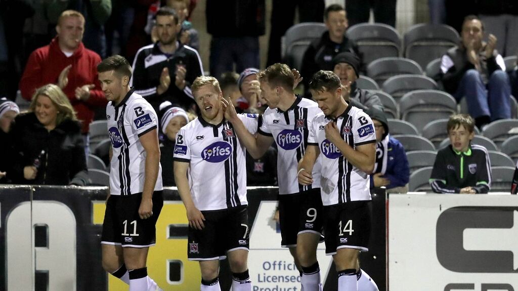 Dundalk’s David McMillan and Daryl Horgan celebrate scoring their team’s third goal of the game. Photograph: Ryan Byrne/Inpho
