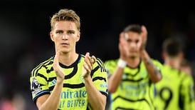 Martin Odegaard’s penalty earns 10-man Arsenal gritty victory at Crystal Palace