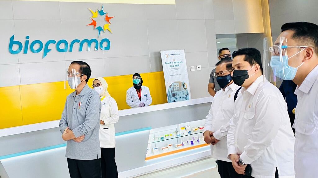 Indonesian President Joko Widodo (left) inspecting coronavirus vaccine trials and production facilities during his visit at the state-owned pharmaceutical company Bio Farma in Bandung, Indonesia. Photograph: EPA/Indonesian presidential palace handout