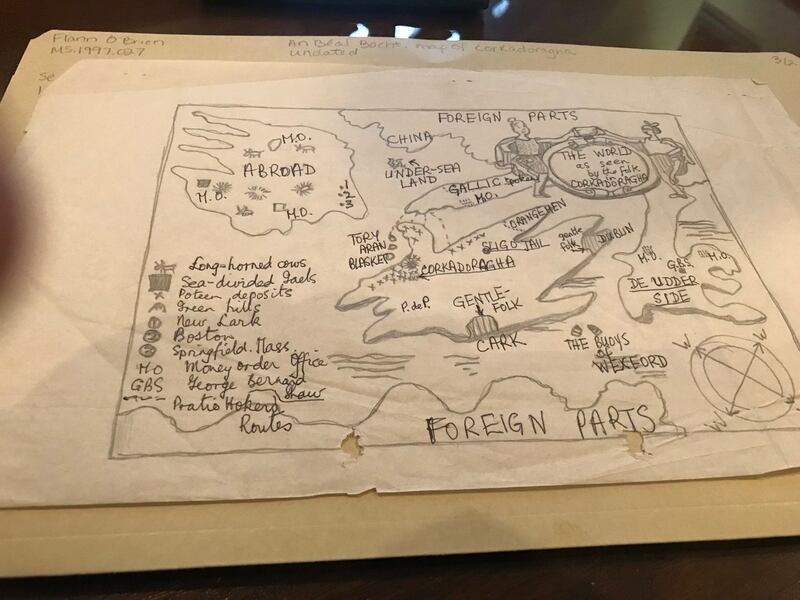 Daniel Mulhall, Ireland’s Ambassador to the US, visited the John J Burns Library in Boston to see the many Irish literary treasures there, including Flann O’Brien’s passports, typewriter and his fabulous sketch of Corca Dorcha drawn for The Poor Mouth