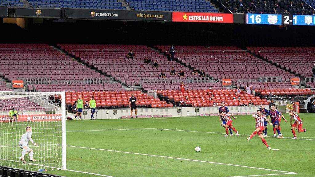 Atletico Madrid’s Saul Niguez scores a second penalty during the LaLiga draw with Barcelona. Photo: Lluis Gene/AFP via Getty Images