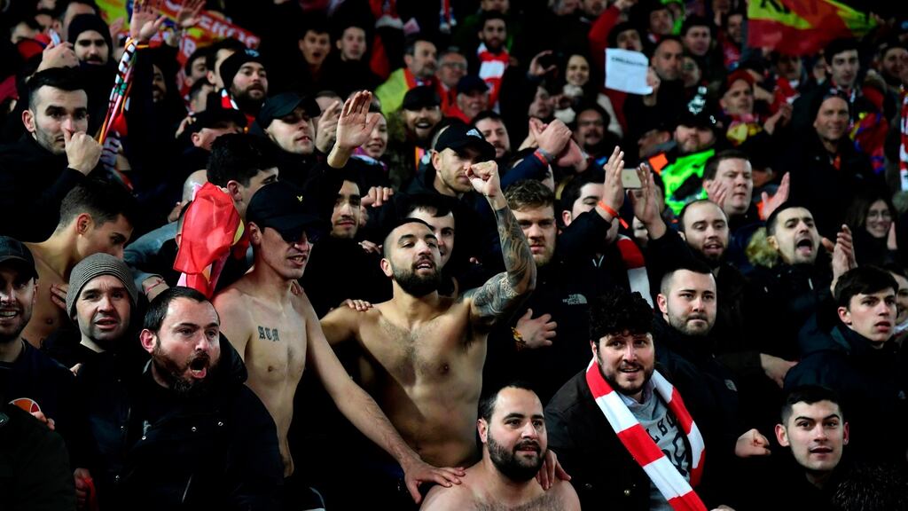 Atletico Madrid fans celebrate the victory over Liverpool at Anfield on Wednesday night. Photograph: Javier Soriano/AFP via Getty Images
