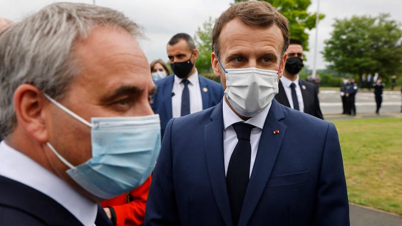 French president Emmanuel Macron with the president of the northern France Hauts-de-France region, Xavier Bertrand, before a visiting to a car factor in Douai this week. Photgraph: Ludovic Marin/POOL/AFP via Getty Images