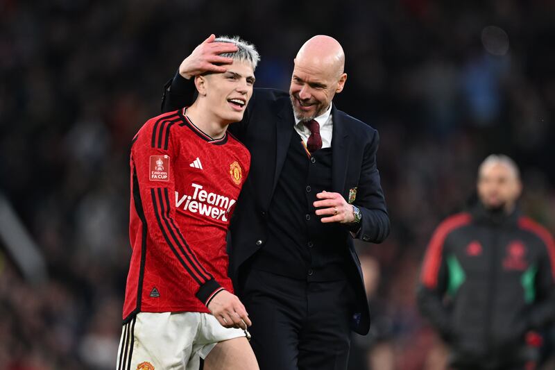 Alejandro Garnacho of Manchester United is embraced by United boss Erik ten Hag after the pulsating game. Photograph: Michael Regan/Getty Images