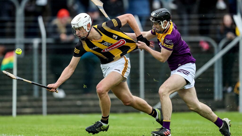 Kilkenny’s Ted Dunne is challenged by  AJ Redmond of Wexford during the  O’Neill’s Leinster under-20 Hurling Championship Final at  Netwatch Cullen Park in Carlow. Photograph: Evan Treacy/Inpho