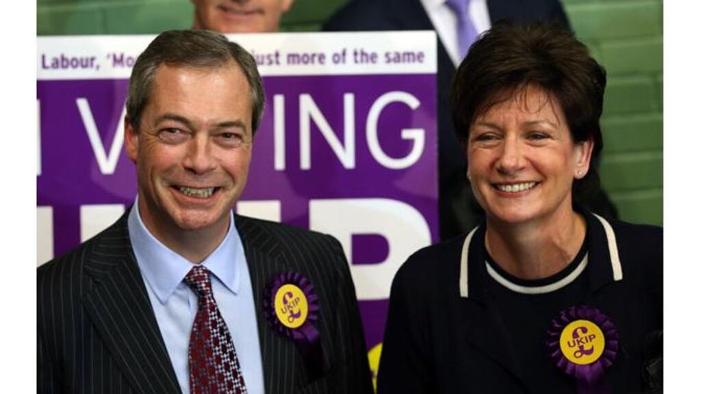 Ukip candidate Diana James (R) is joined by party leader Nigel Farrage as they celebrate beating the Conservatives to a second place at the Eastleigh byelection. Photograph: Matt Cardy/Getty Images.