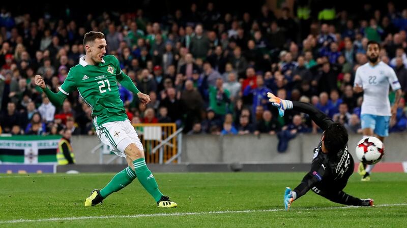 Northern Ireland’s Gavin Whyte scores their third goal during the international friendly against Israel at Windsor Park. Photograph: Jason Cairnduff/Action Images via Reuters