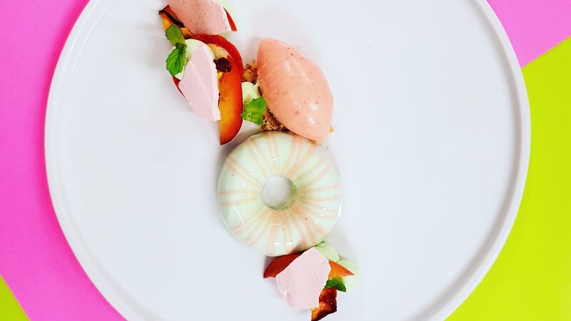 Peach mousse, sacher sponge, apple mint whipped ganache, peach meringue, poached peaches, peach sorbet made and photographed by Gráinne Mullins