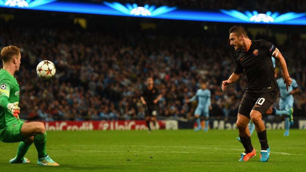 Francesco Totti of AS Roma scores the equaliser against Manchester City. The 38-year-old became the oldest scorer in Champions League history at the Etihad. Photograph: Laurence Griffiths/Getty Images