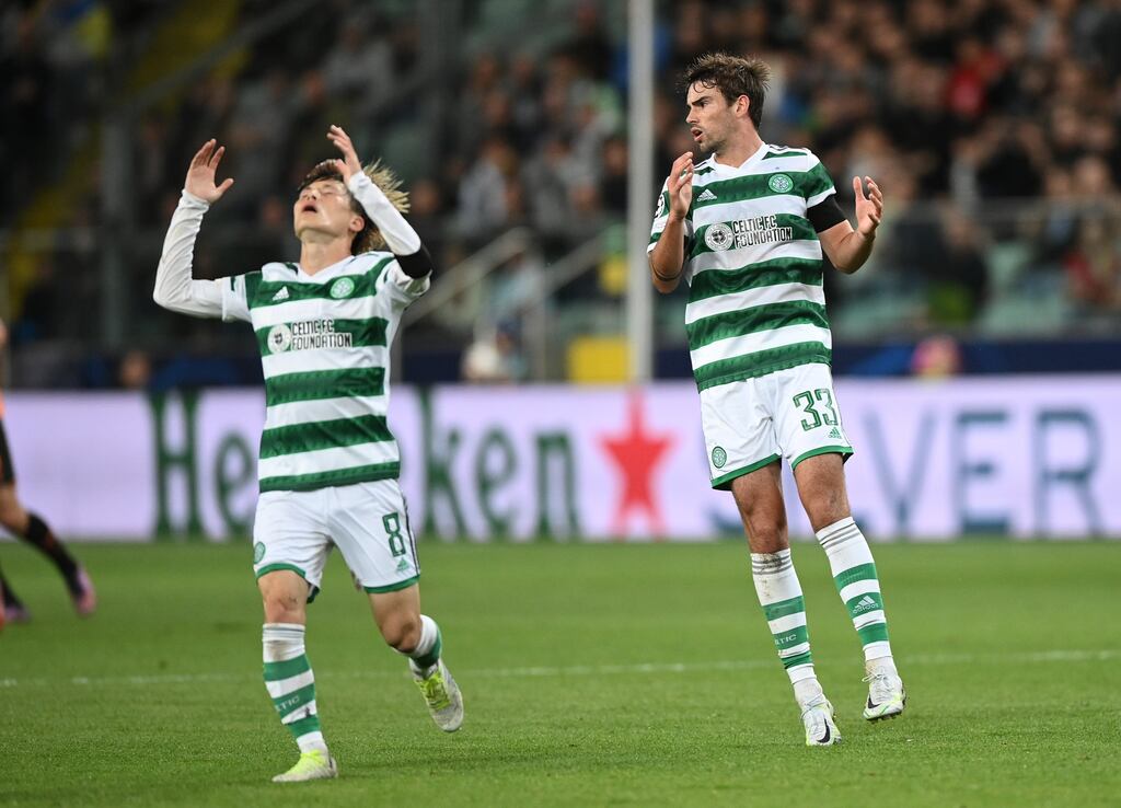 Celtic's Matt O'Riley (right) and Kyogo Furuhashi rue a missed chance away to Shakhtar Donetsk. Photograph: Rafal Oleksiewicz/PA