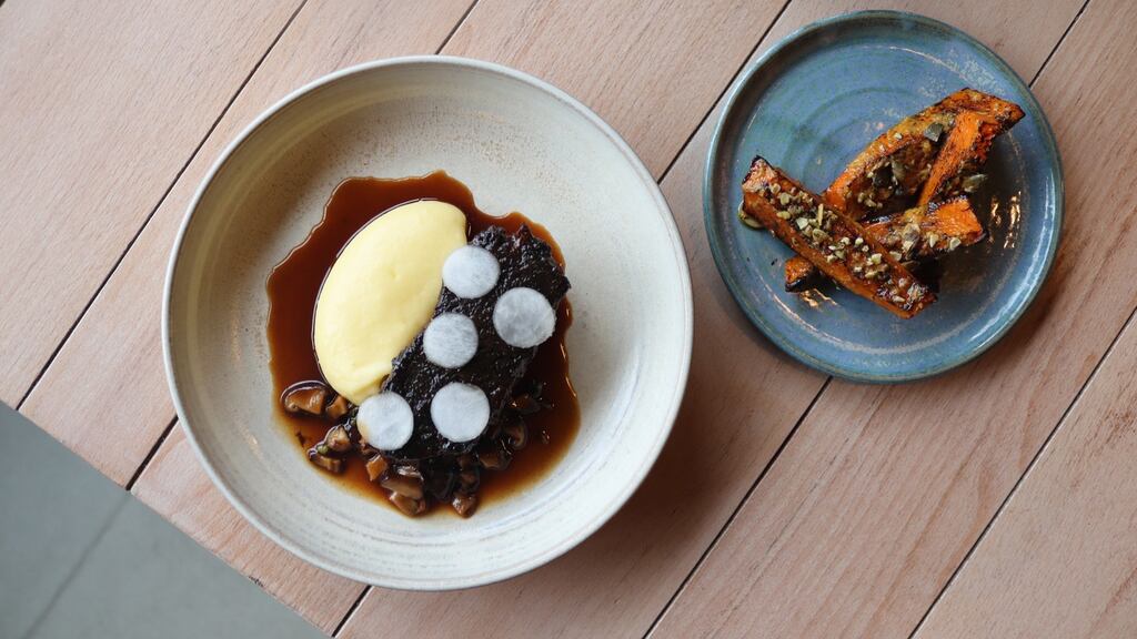 Slow-cooked beef shin, with mushroom duxelles, confit onions and thyme