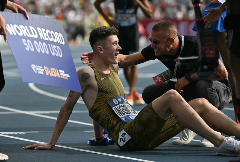 Norway's Jakob Ingebrigtsen reacts after setting a new world record in the men's 3000m event of the Silesia Diamond League athletics meeting in Chorzow, Poland. Photograph: Sergei Gapon/AFP/ via Getty Images