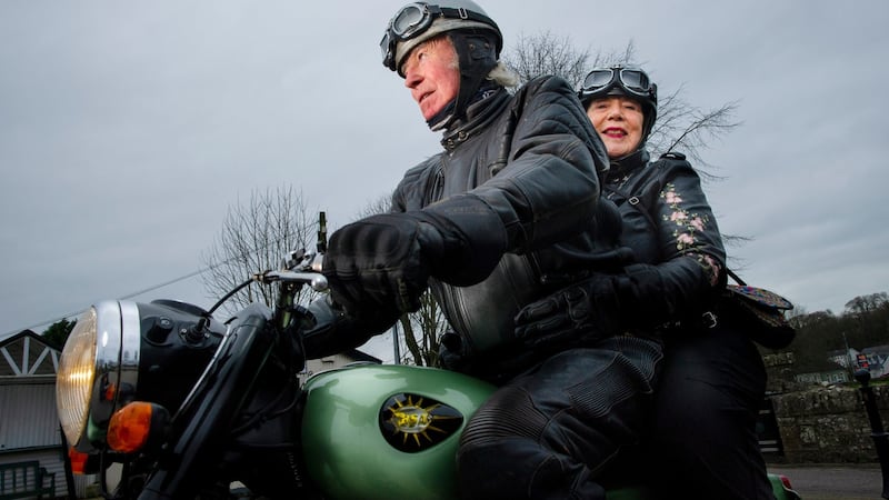 Andy and Eileen Casey from Killeens, Cork, with their restored BSA A50 motorbike. ‘I think she fell in love with the bike more than me.’ Photograph: Daragh McSweeney/Provision