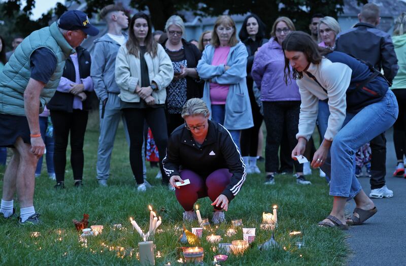 Locals held a candlelit vigil on the village green in Donabate on Tuesday for the missing child, who gardaí believe is dead. Photograph: Colin Keegan/Collins Dublin