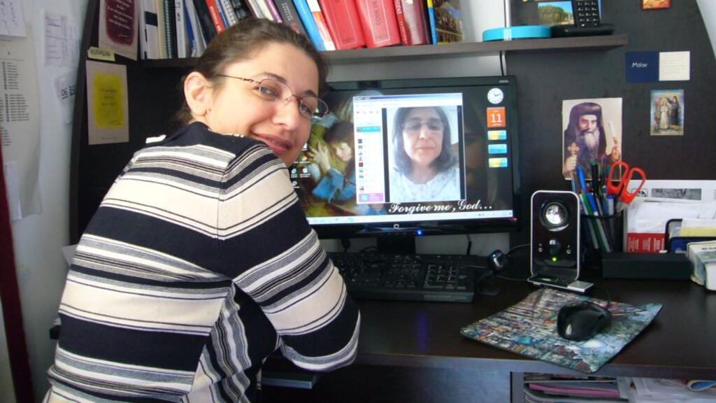 Inas (left), an Iraqi Christian living in exile in Paris, talks often to her sister Mariam, a refugee from the jihadists of the Islamic State, via Skype. Photograph: Lara Marlowe