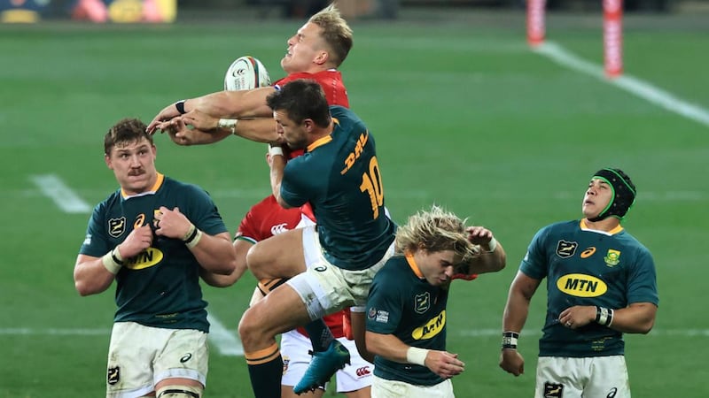 Duhan van der Merwe of the Lions tries to catch the ball under pressure from South Africa’s Handré Pollard during the second Test. Photograph: David Rogers/Getty Images